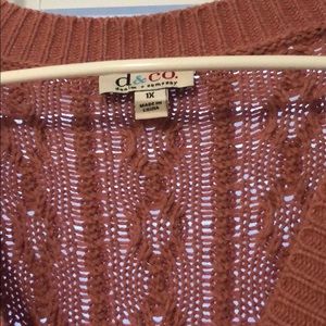 Dusty rose colored full length cable knit cardigan